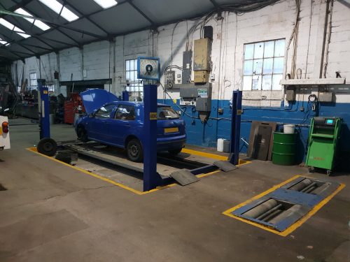 dh-coachworks-interior-with-blue-car
